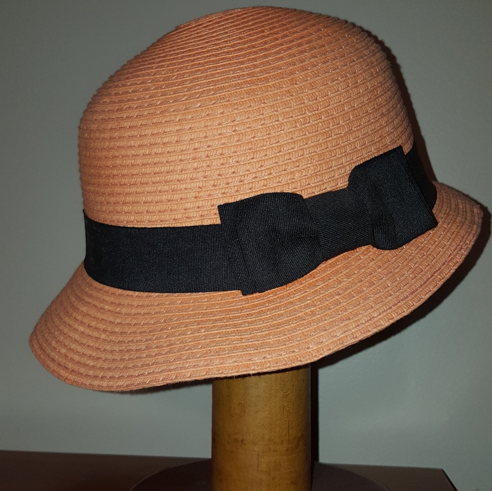 Peach hat,  fedora style with black ribbon
